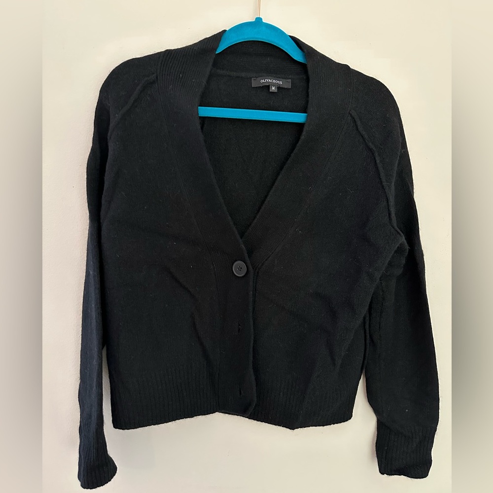 Black wool cardigan by Olivaceous